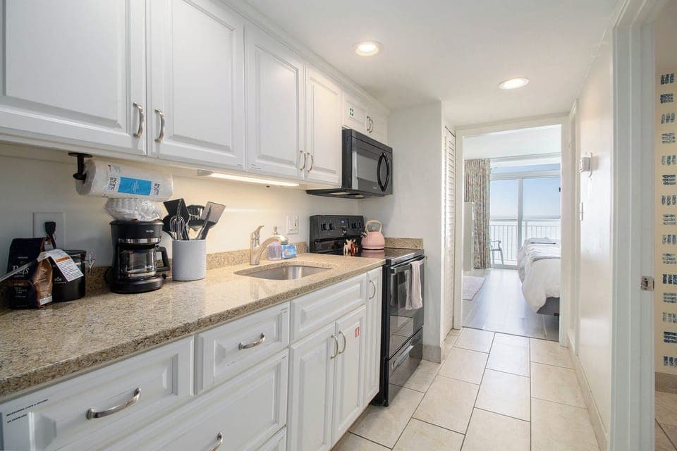 Condo, 1 Bedroom, Balcony, Oceanfront (1610) | Private kitchen | Full-size fridge, microwave, oven, stovetop
