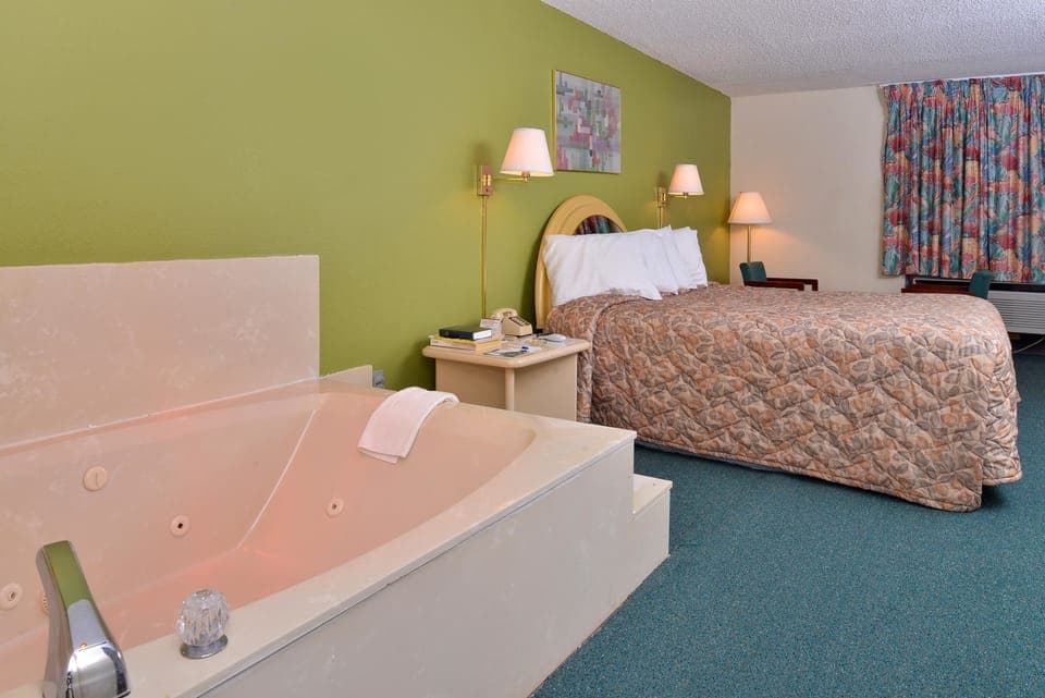 Desk, blackout drapes, iron/ironing board, rollaway beds