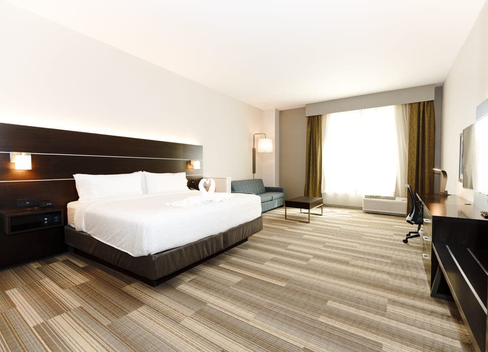 Suite, 1 King Bed | In-room safe, desk, laptop workspace, blackout drapes