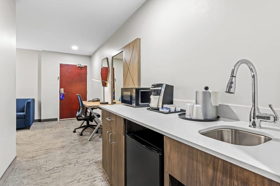 Suite, 2 Queen Beds | Desk, blackout drapes, iron/ironing board, free WiFi