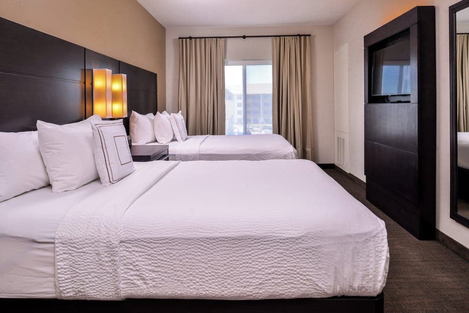 Suite, 1 Bedroom | Desk, laptop workspace, blackout drapes, iron/ironing board