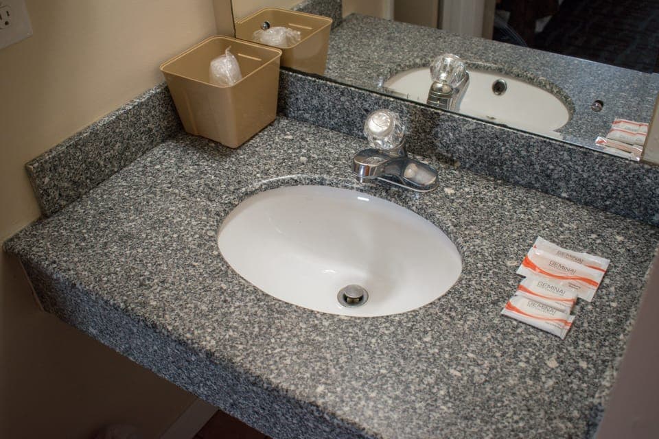 Bathtub, hair dryer, towels