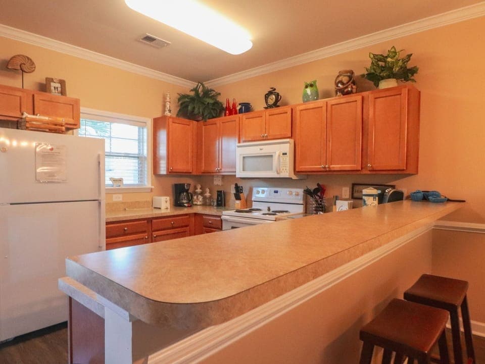 Condo, 2 Bedrooms | Private kitchen | Fridge, microwave, oven, dishwasher