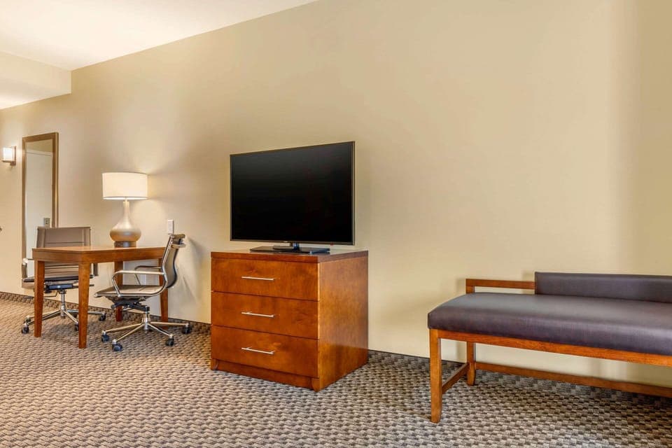 Pillowtop beds, desk, blackout drapes, iron/ironing board