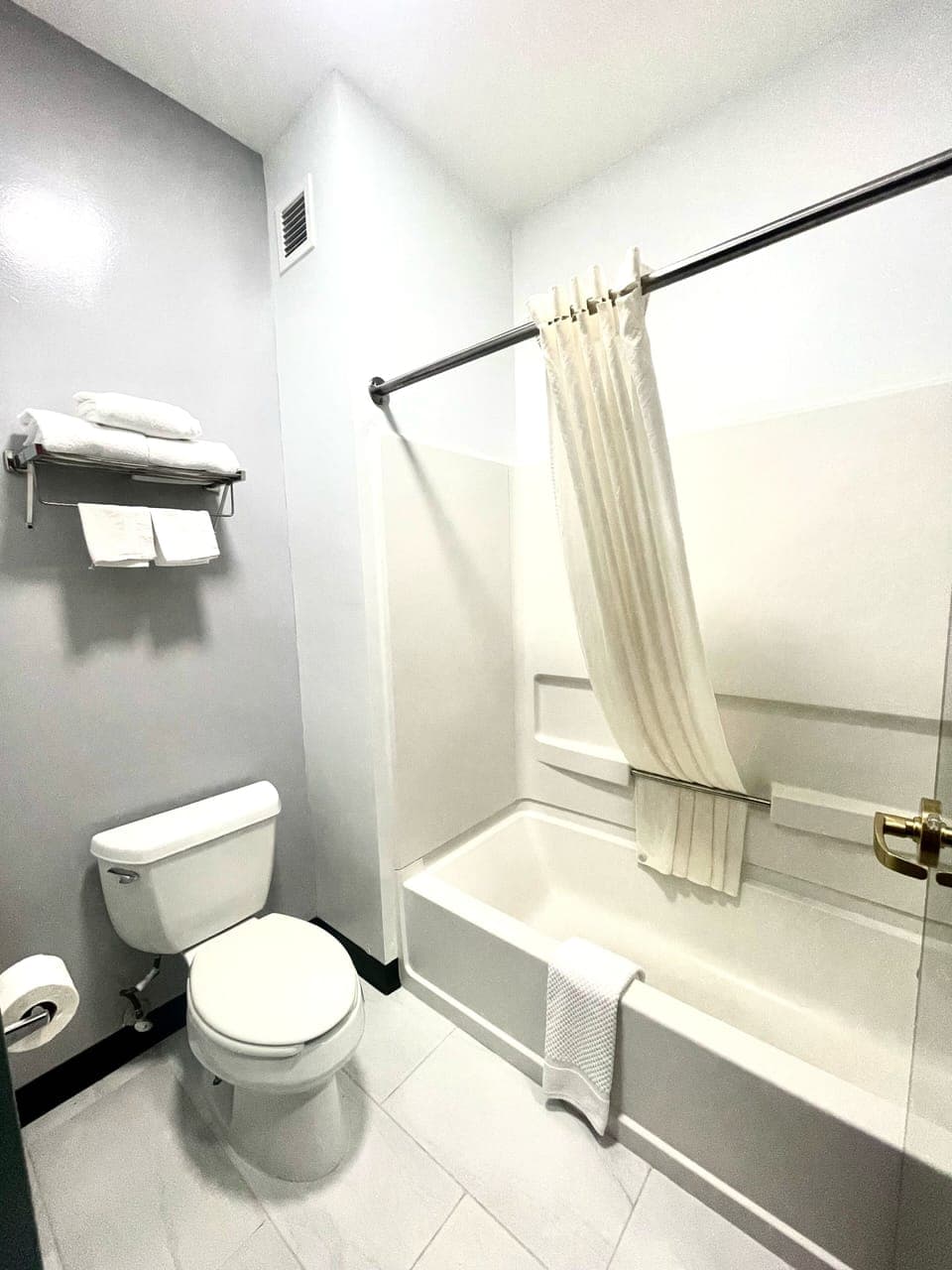 Standard Room, 2 Queen Beds | Bathroom | Combined shower/tub, free toiletries, hair dryer, towels