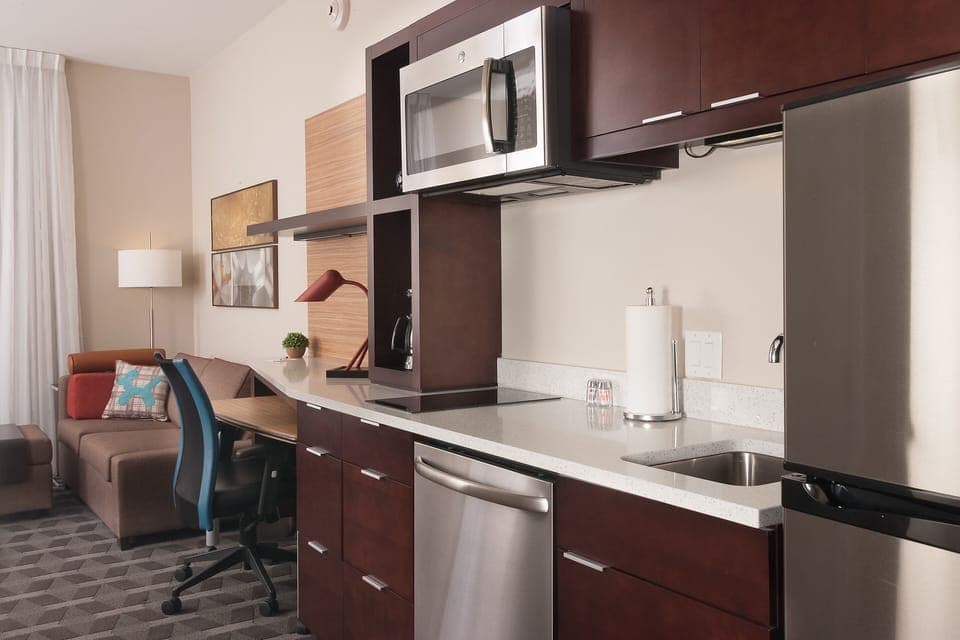 Studio, 2 Queen Beds | 1 bedroom, iron/ironing board, free cribs/infant beds, free WiFi