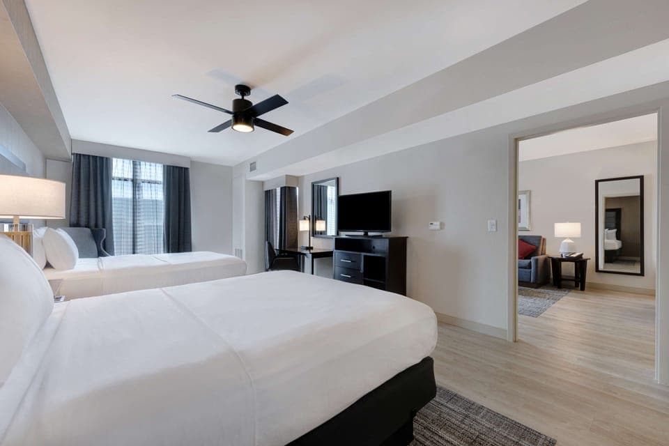 Premium bedding, pillowtop beds, desk, laptop workspace