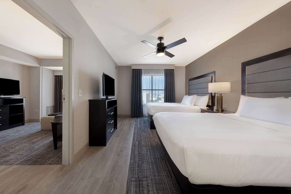 Premium bedding, pillowtop beds, desk, laptop workspace