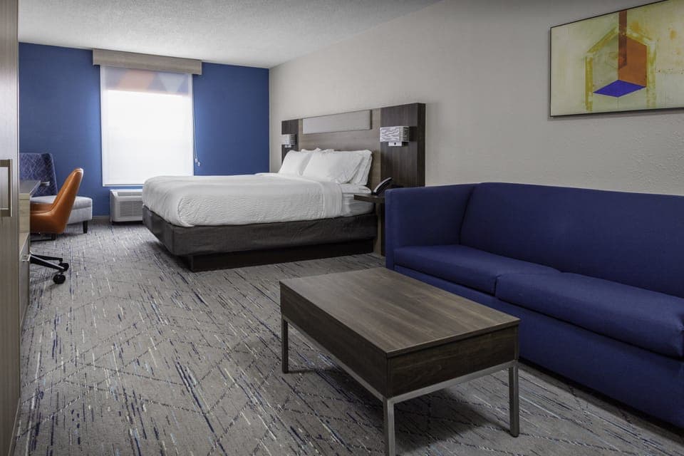 Suite, 1 King Bed (Additional Living Area) | In-room safe, desk, iron/ironing board, free cribs/infant beds