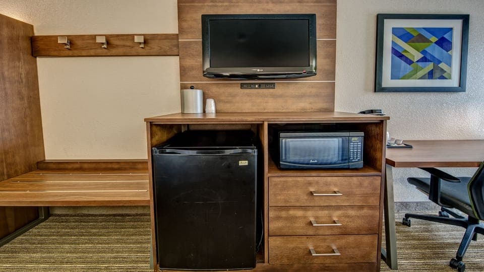 Down comforters, pillowtop beds, in-room safe, desk