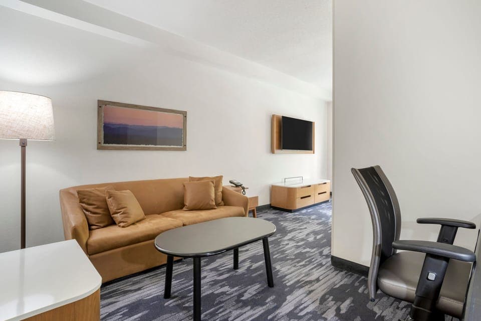 Suite, 1 King Bed with Sofa bed | Desk, blackout drapes, iron/ironing board, free WiFi