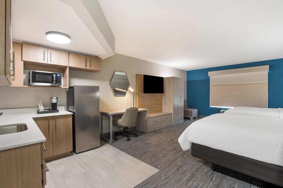 Suite, 2 Queen Beds, Accessible (Communications) | In-room safe, desk, laptop workspace, blackout drapes