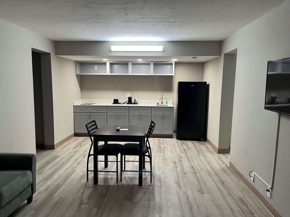 Stovetop, freezer, dining tables