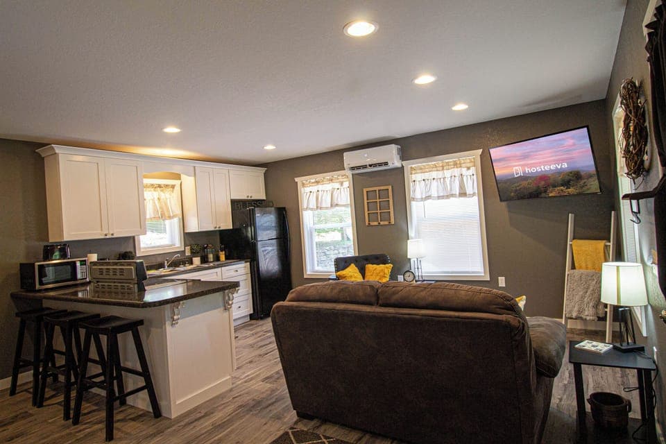 Signature Cabin, 2 Bedrooms, Non Smoking, Balcony | Living room | 45-inch Smart TV with cable channels