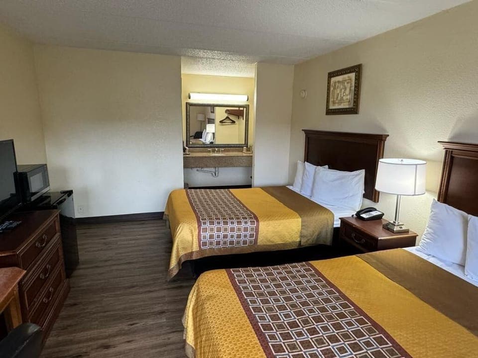 Basic Room, 2 Queen Beds, Non Smoking | 1 bedroom, free WiFi, bed sheets