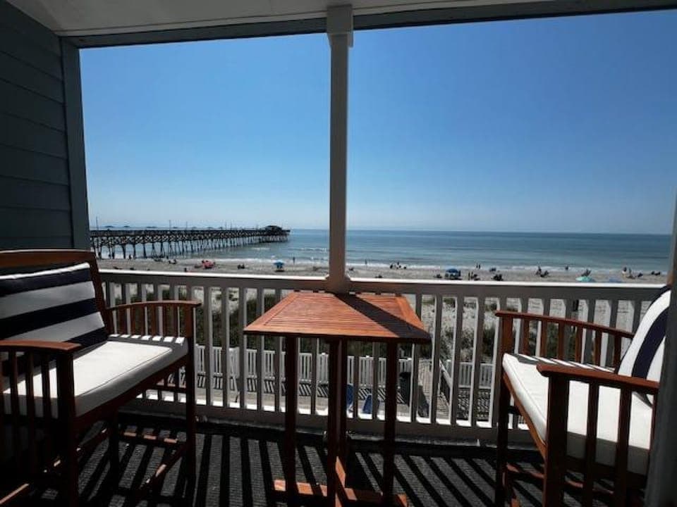 Balcony with view of pier
