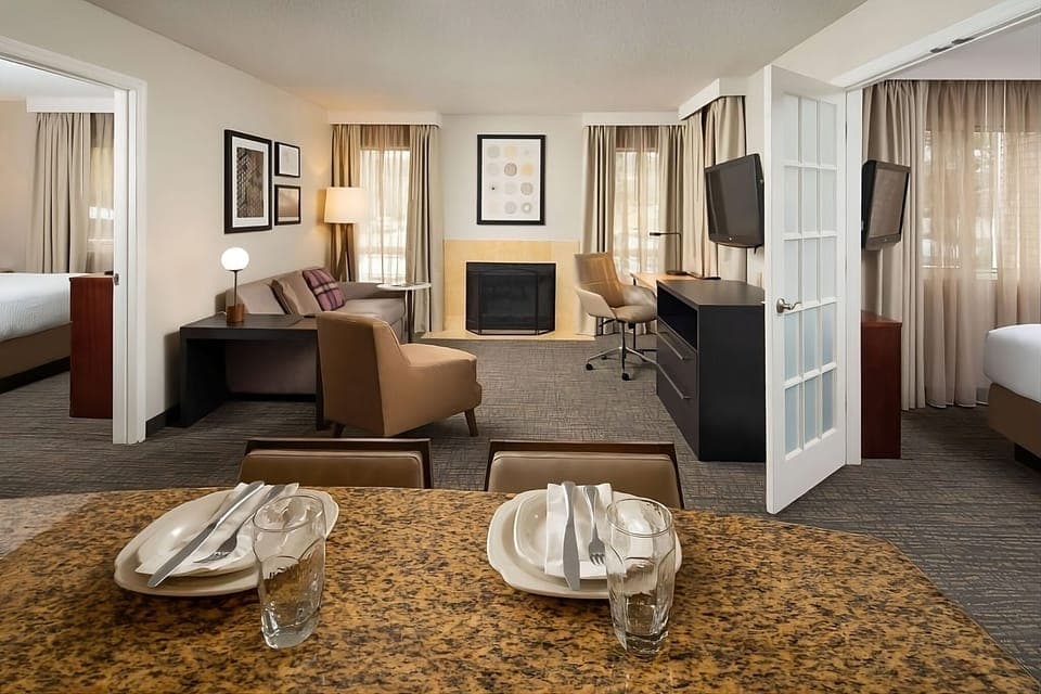 Gather for snacks and conversation in an airy, open-plan suite.