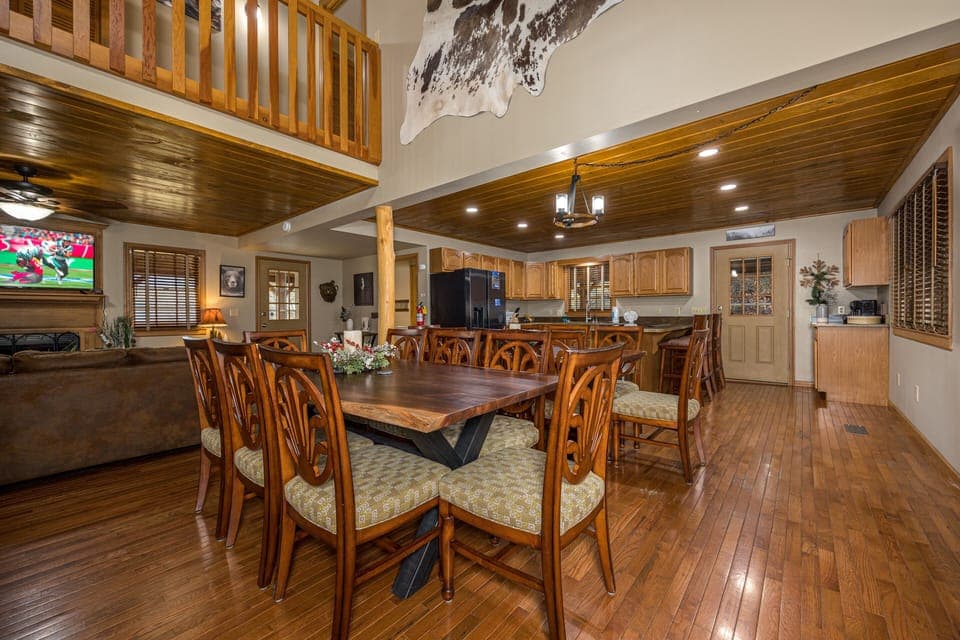 Dining table open to living room & kitchen
