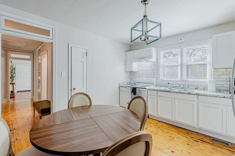 A bright and welcoming kitchen and dining area, perfect for cooking, sharing meals, and creating memories.