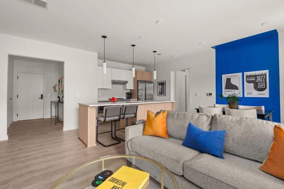Living room with open kitchen view