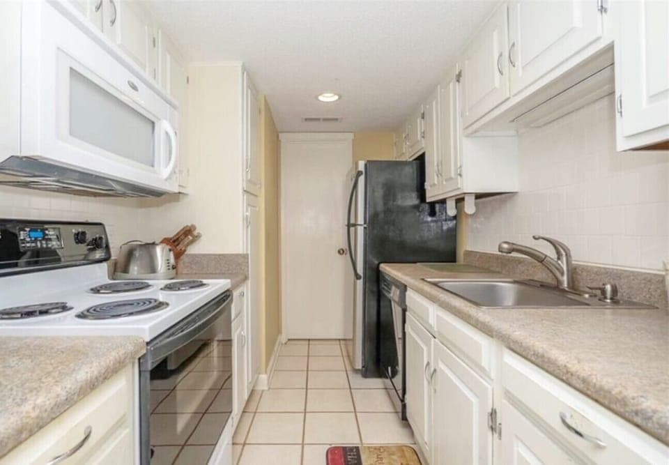 Fully stocked kitchen with all the essentials, perfect for cooking at home during your stay.