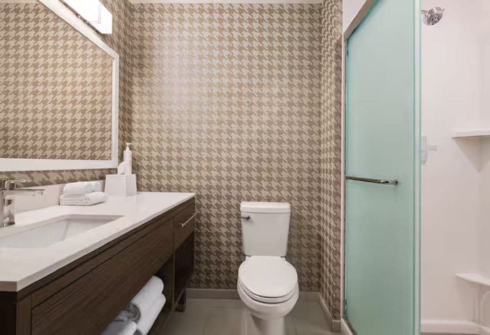 Enjoy a quick rinse in the spacious walk-in shower.