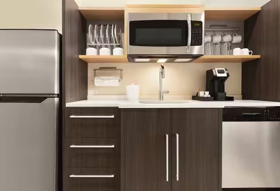 Start mornings easily with kitchenette, coffee station, and mini fridge.