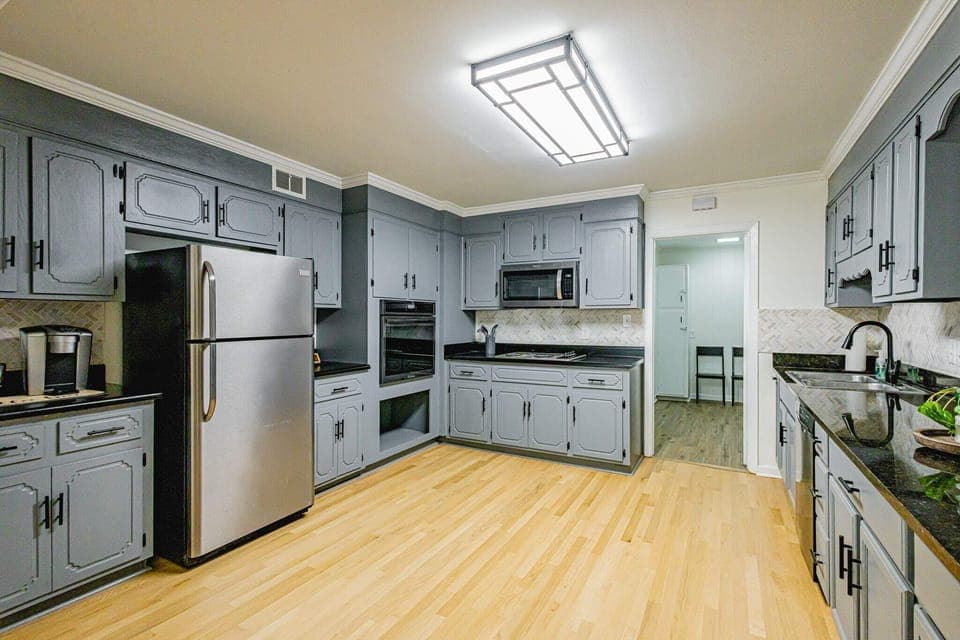 Modern appliances, cookware and coffee maker included. 