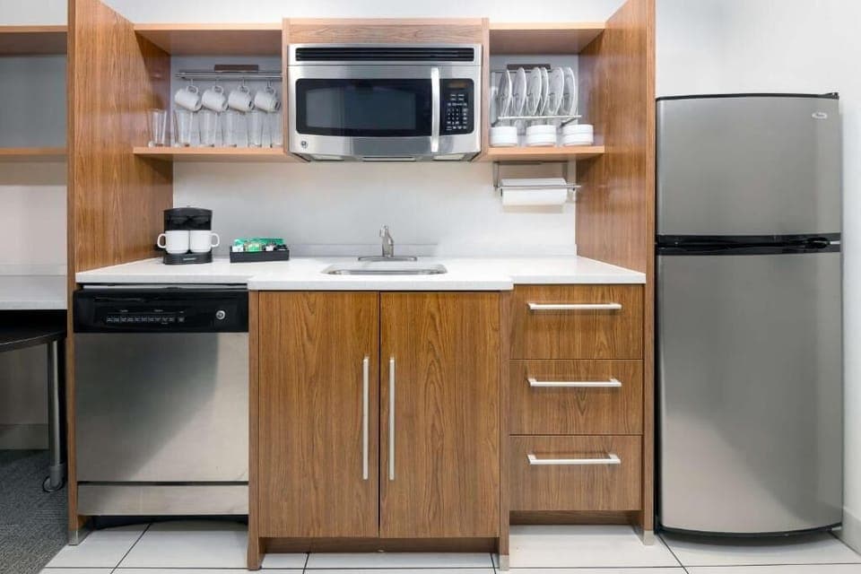 Prepare simple bites with full-size fridge and microwave ready.