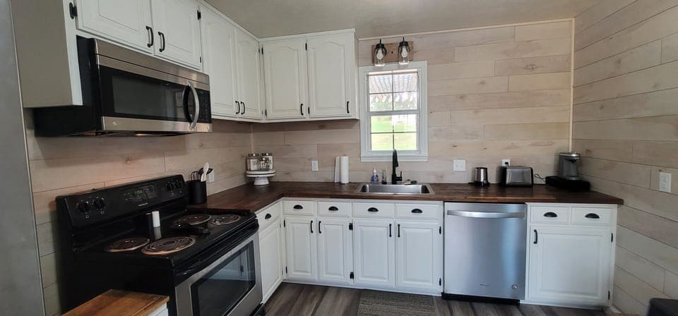 Limited cabinet space but we've put all the dishes and pots and pans we can in!
