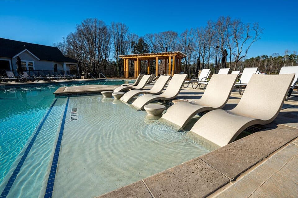 Shared Amenity: Find your sanctuary surrounded by nature. Refresh your mind and spirit with dips in the glistening pool.