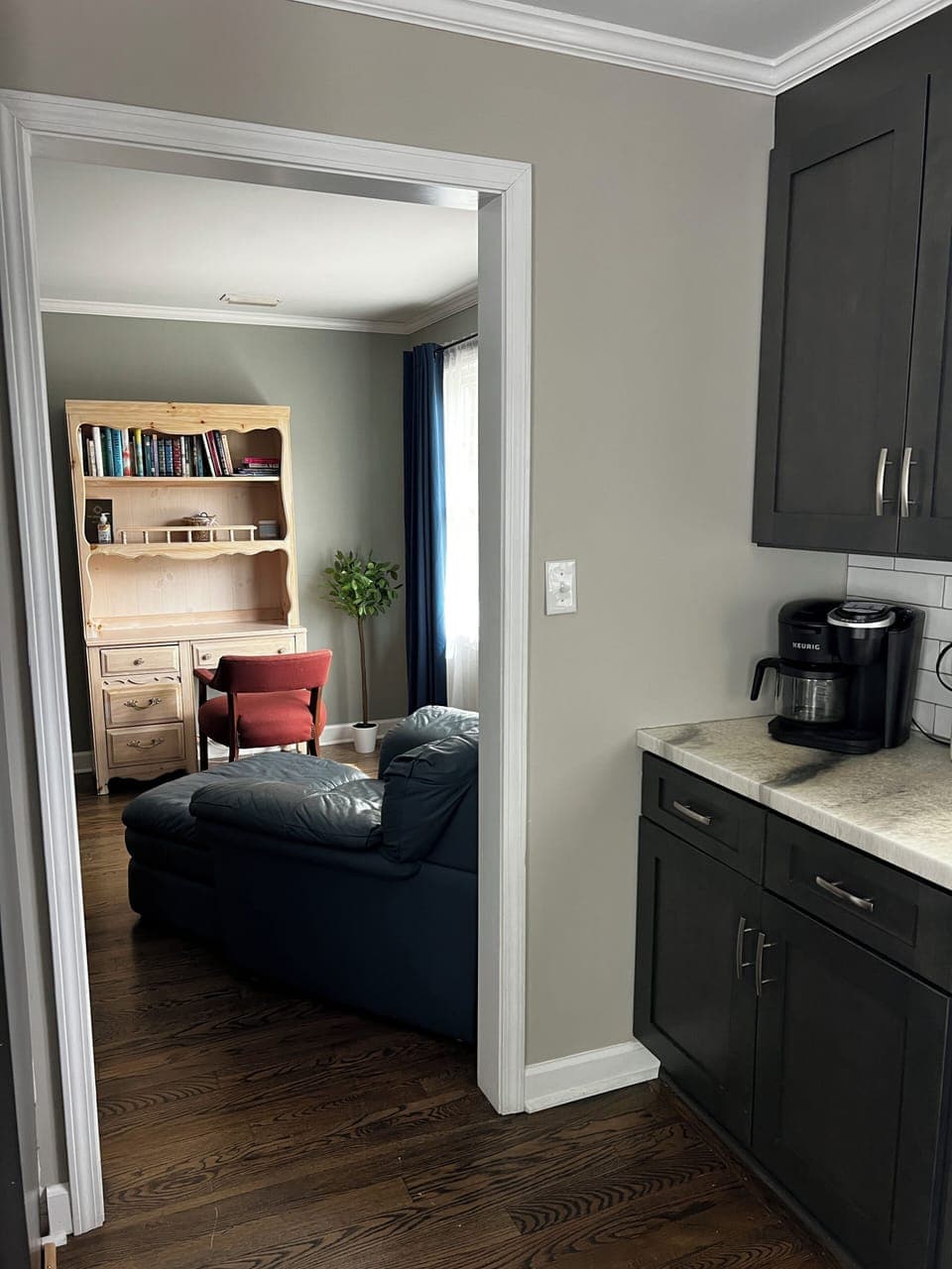 Kitchen connects to den