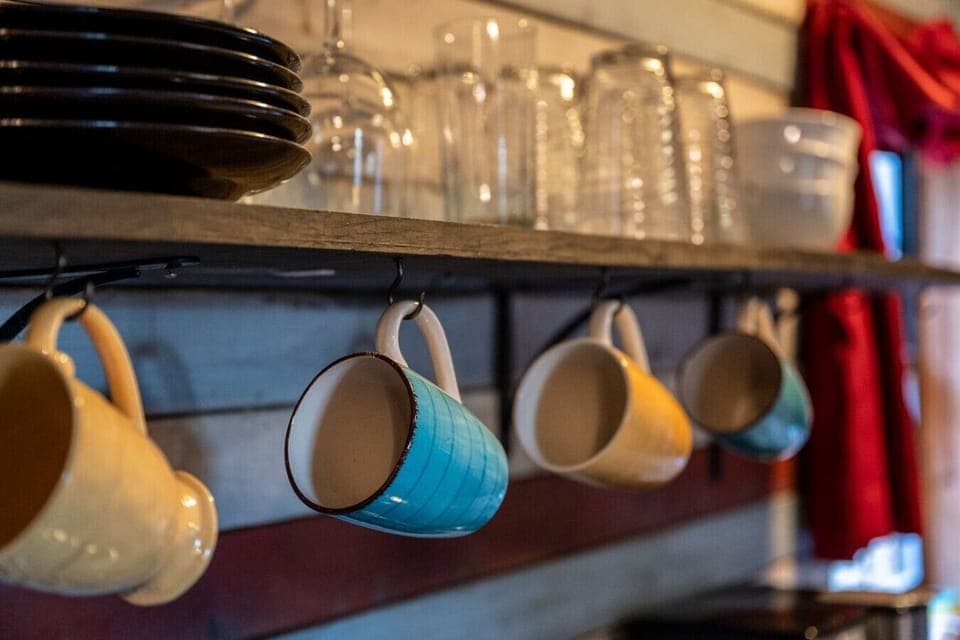 Plenty of mugs provided for your morning cups of coffee.