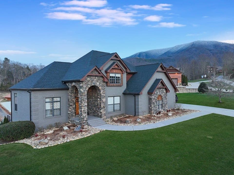 Spacious home with stone accents and mountain views in a peaceful setting