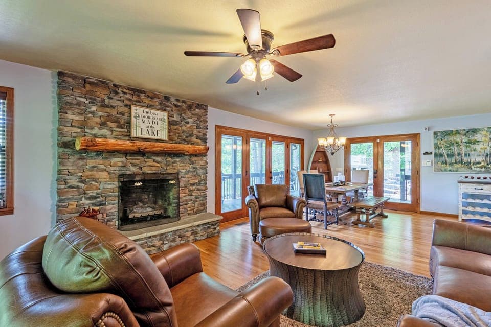 Wall-to-wall comfort meets water views in this lakefront cabin retreat.