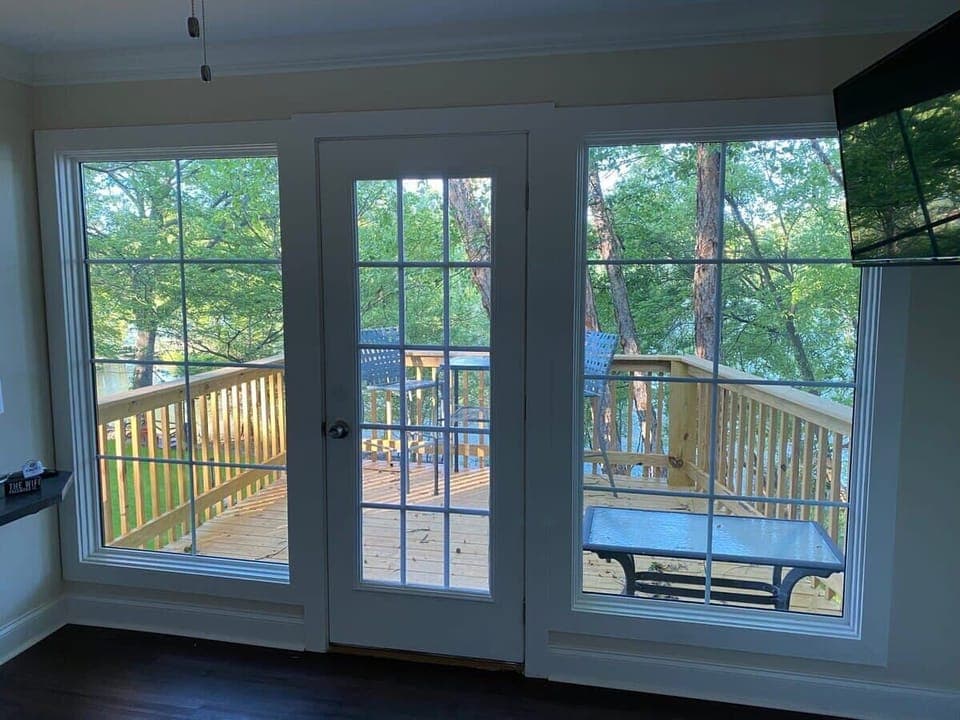 A full wall of windows and a door lead from the upstairs Master Bedroom to a private deck - perfect for morning coffee or evening sunsets.