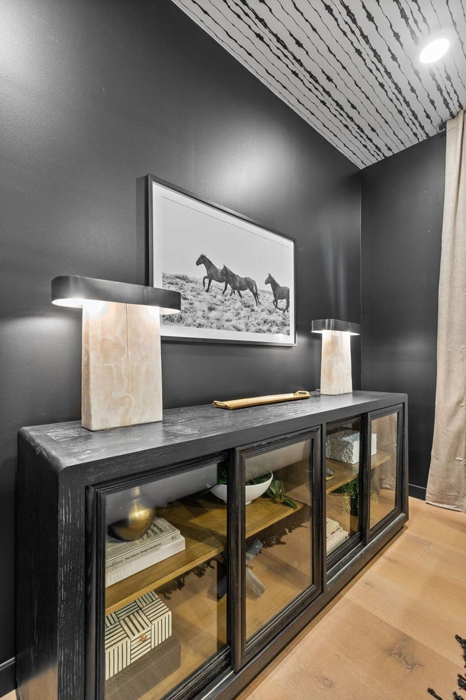 2nd Floor: Primary bedroom with King bed, smart TV, designer furnishings and en-suite bathroom.