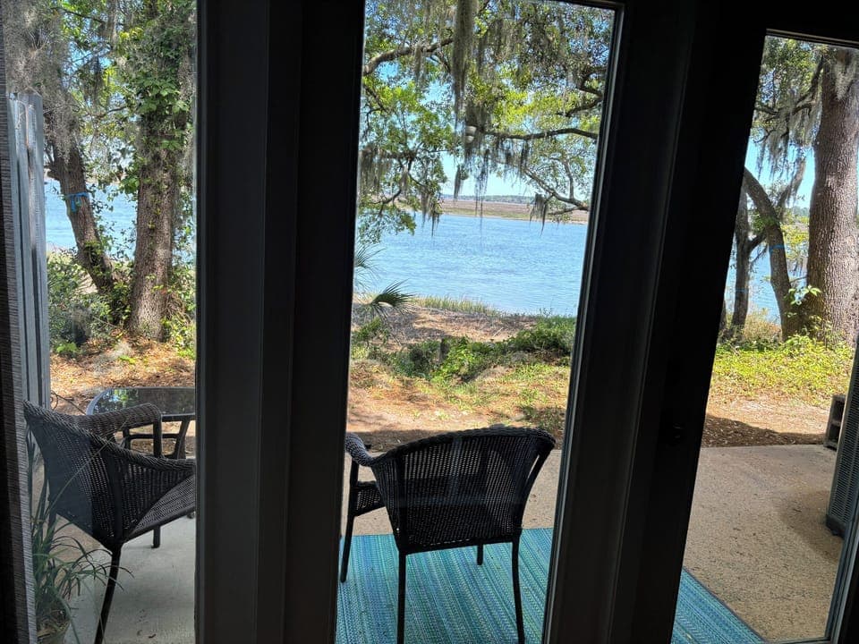View of Battery Creek from inside the unit.