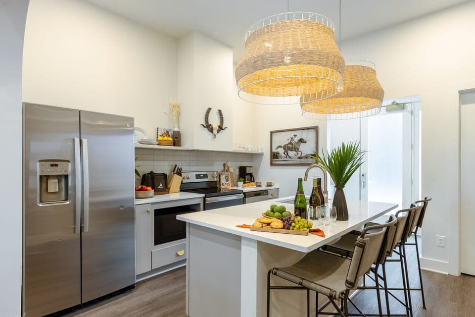 Fully equipped kitchen with a full suite of stainless steel appliances.