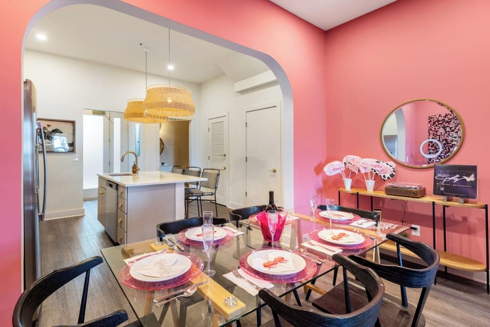 The dining area leads to the kitchen.