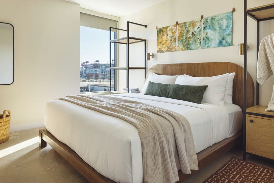 Unwind in sunlit comfort with a plush king bed.