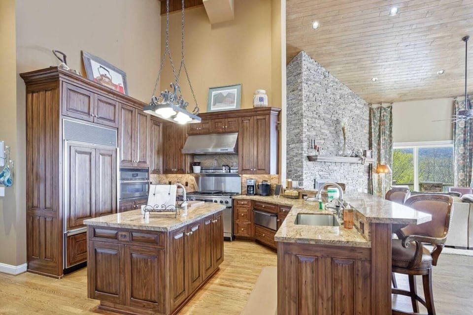 Oversized Granite Countertops and Stainless Steel Appliances