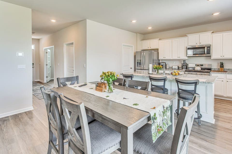 Dining Area | Dishware & Flatware Provided | Central A/C & Heat | 1st Floor