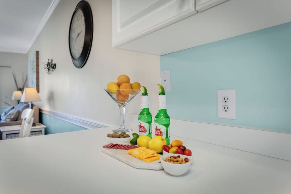 Prepare your favorite meals in the modern kitchen, complete with all the necessary appliances and cookware.