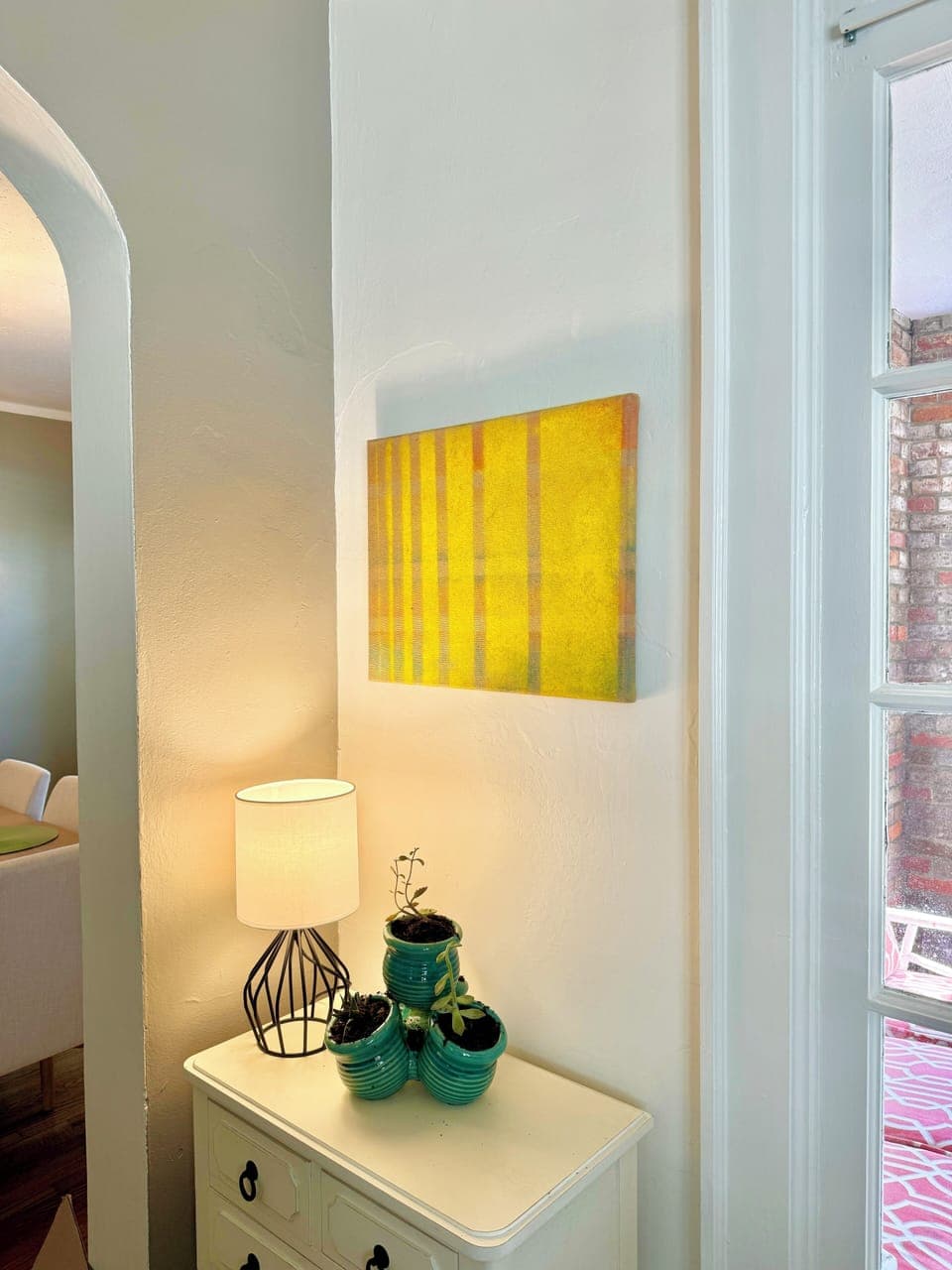 Adding to the vibe, are plants and original art around every corner.