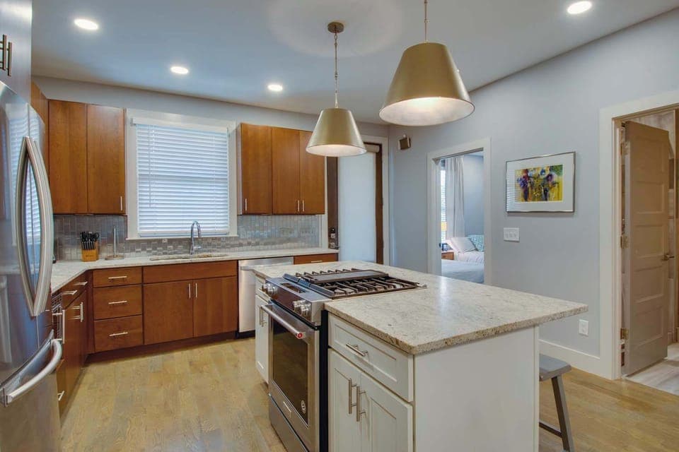 Full kitchen with stainless steel appliances