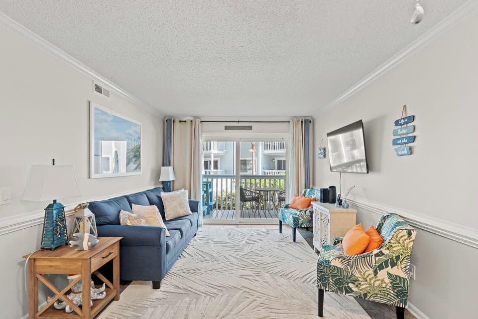 This comfy living room offers space for everyone to gather!