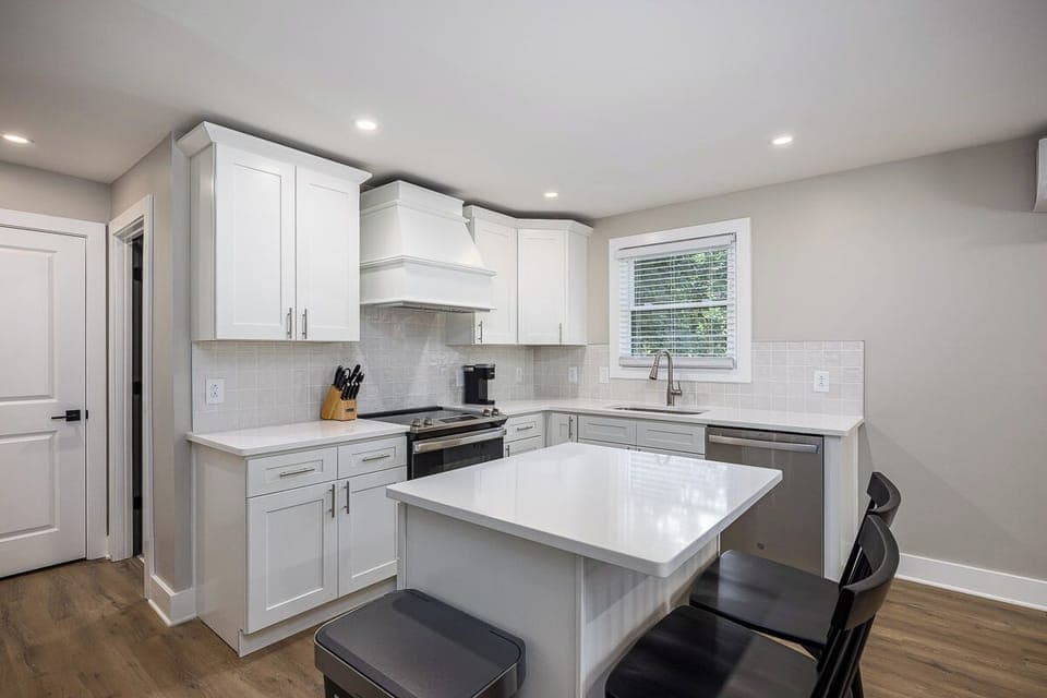 Kitchen area featuring a countertop and seating tools.