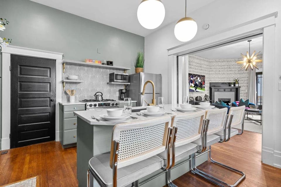 Unit 1: The kitchen on the first floor has stainless steel appliances. (1st Floor)