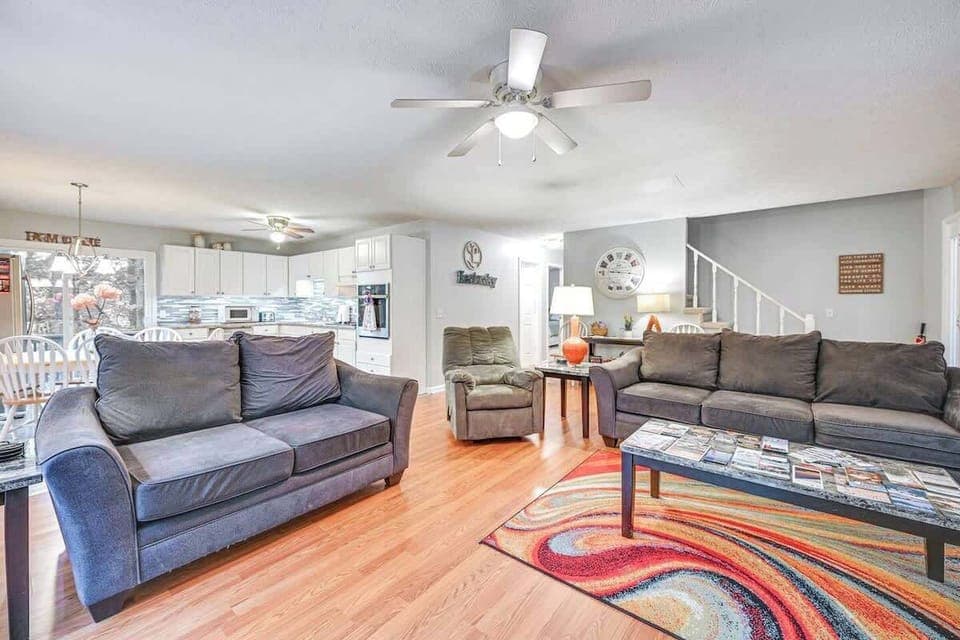 Bright living room filled with natural light for a cozy and inviting feel.